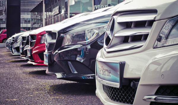A row of Mercedes-Benz vehicles parked side by side